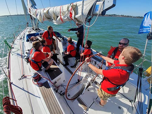 photo of team on a boat